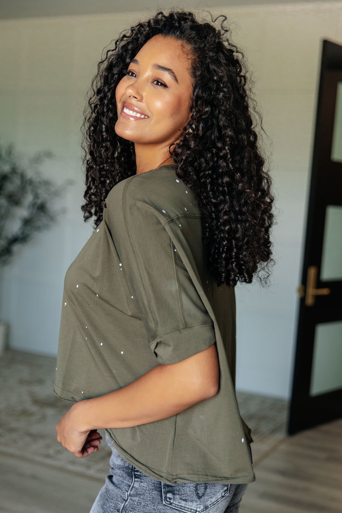 Less Than Stressed Asymmetrical Distressed Top - 5/22/2025