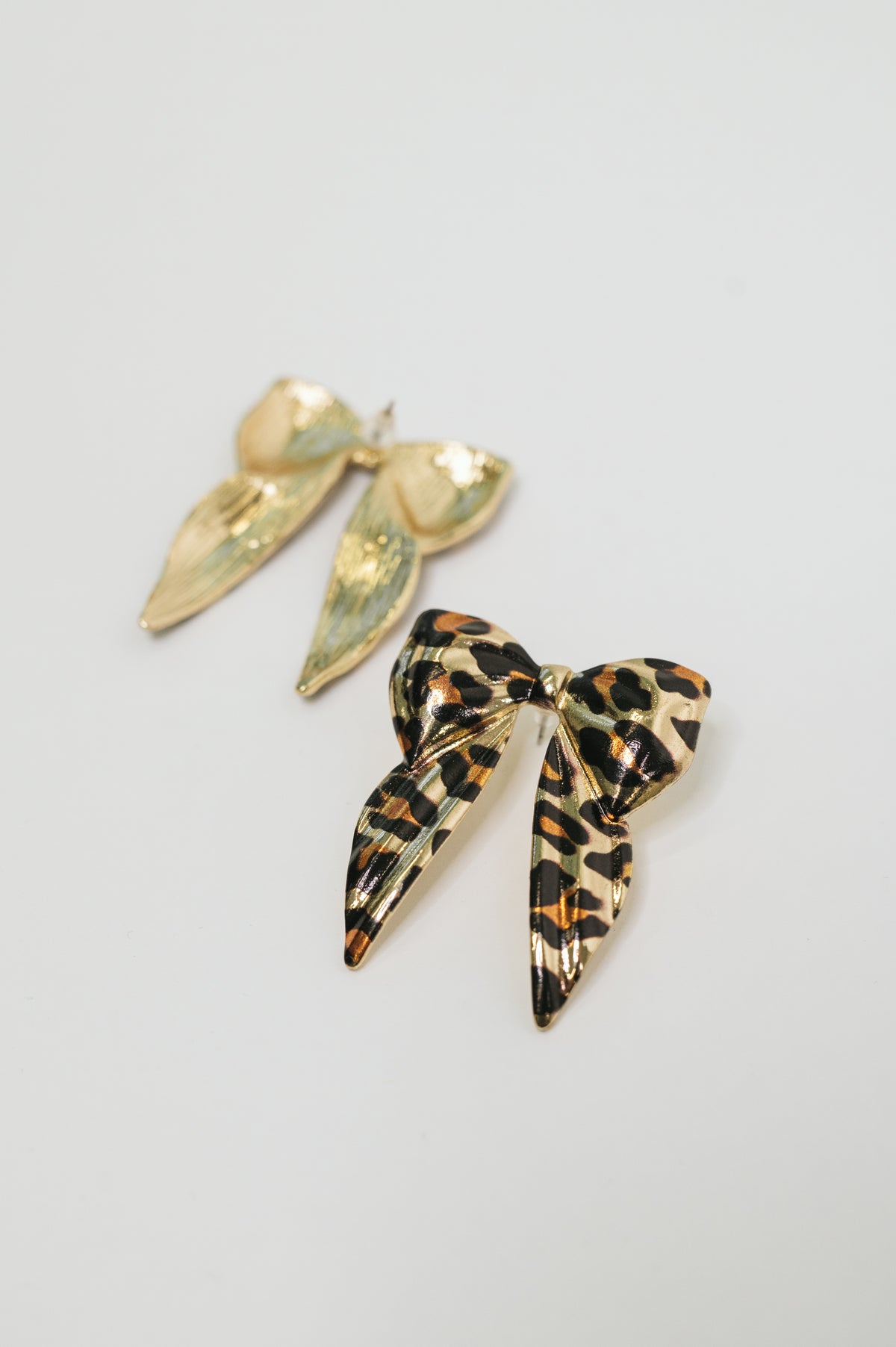 Bow'd & Bold Leopard Print Bow Earrings - 10/9/2026