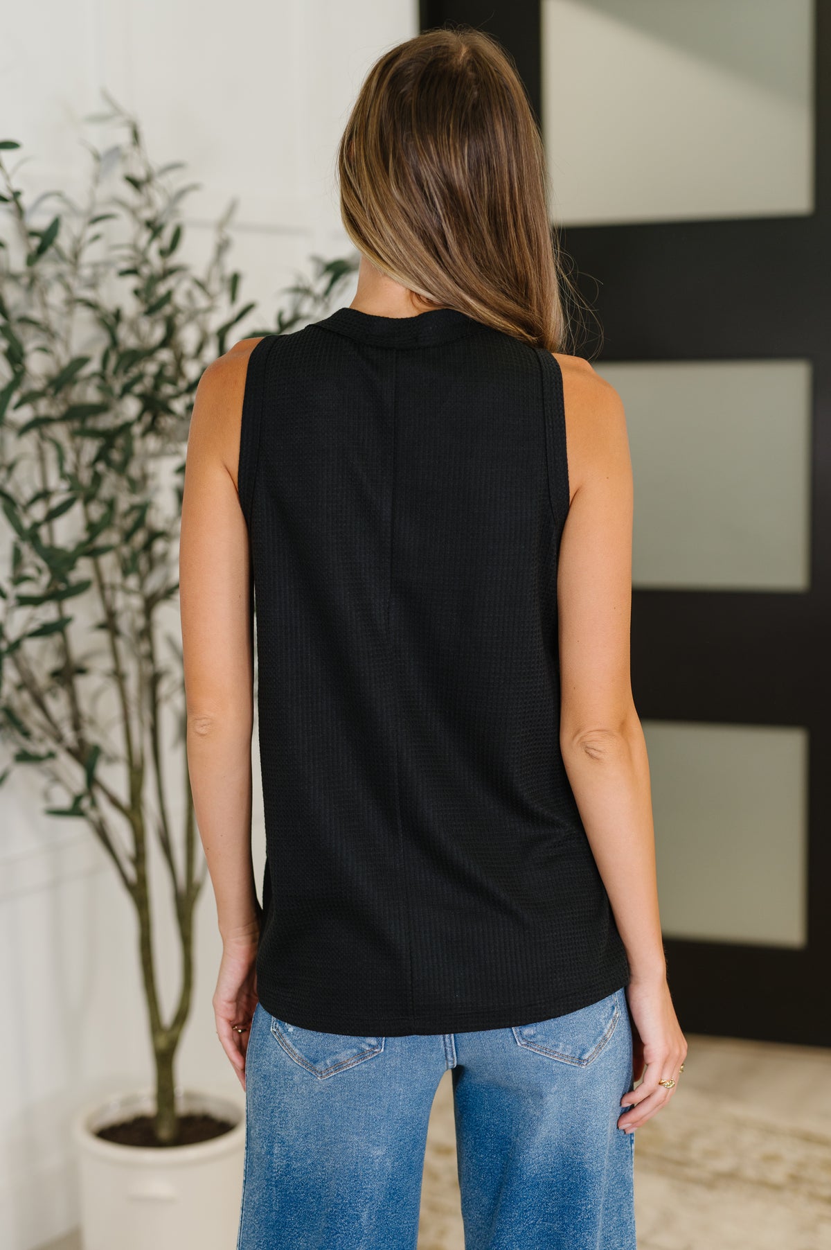 Buttoned Up Buttercup Sleeveless Top in Black - 7/8/2025