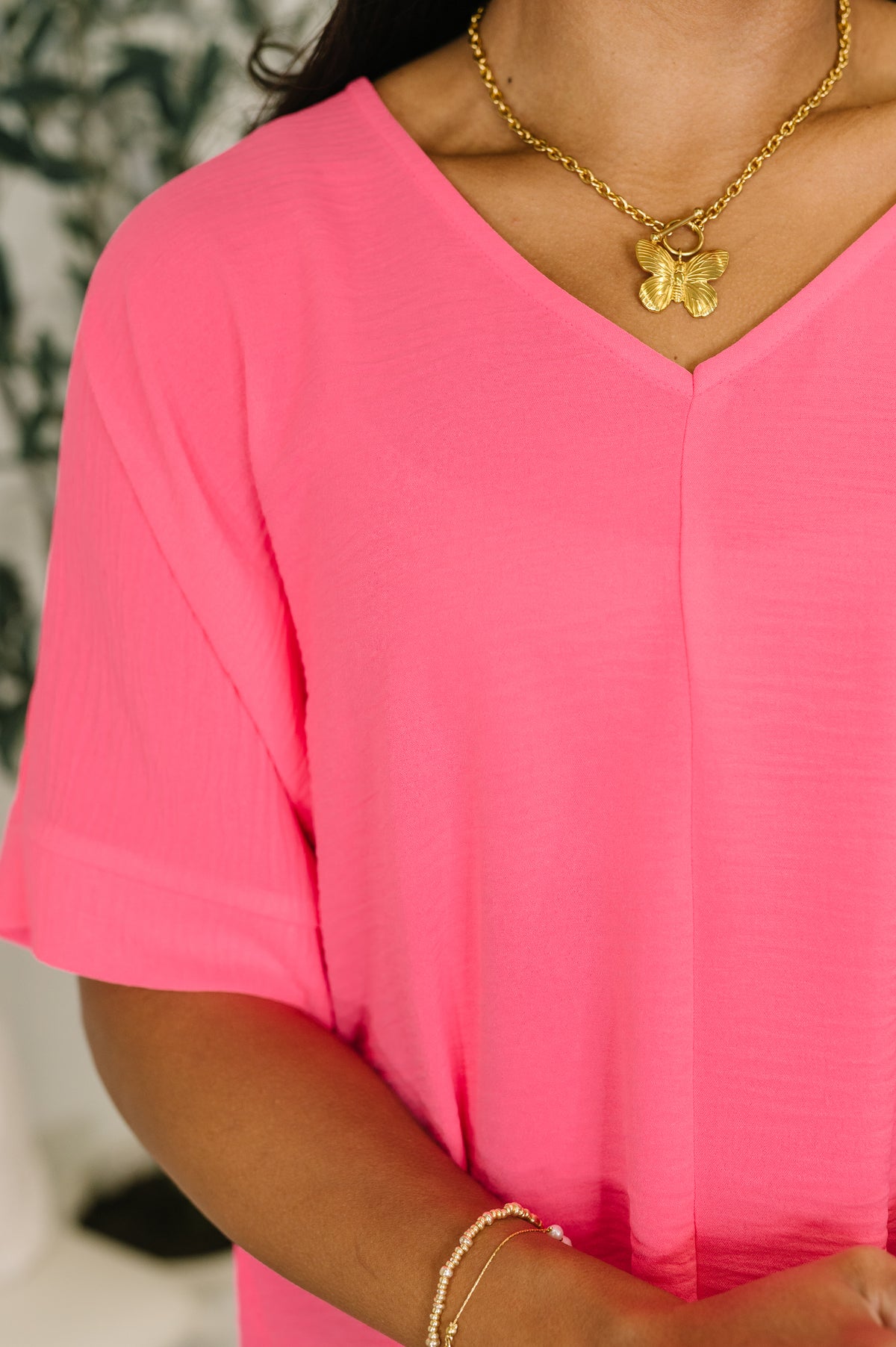 Counter Part Crinkle Woven V-Neck Top in Neon Fuchsia - 2/4/2026