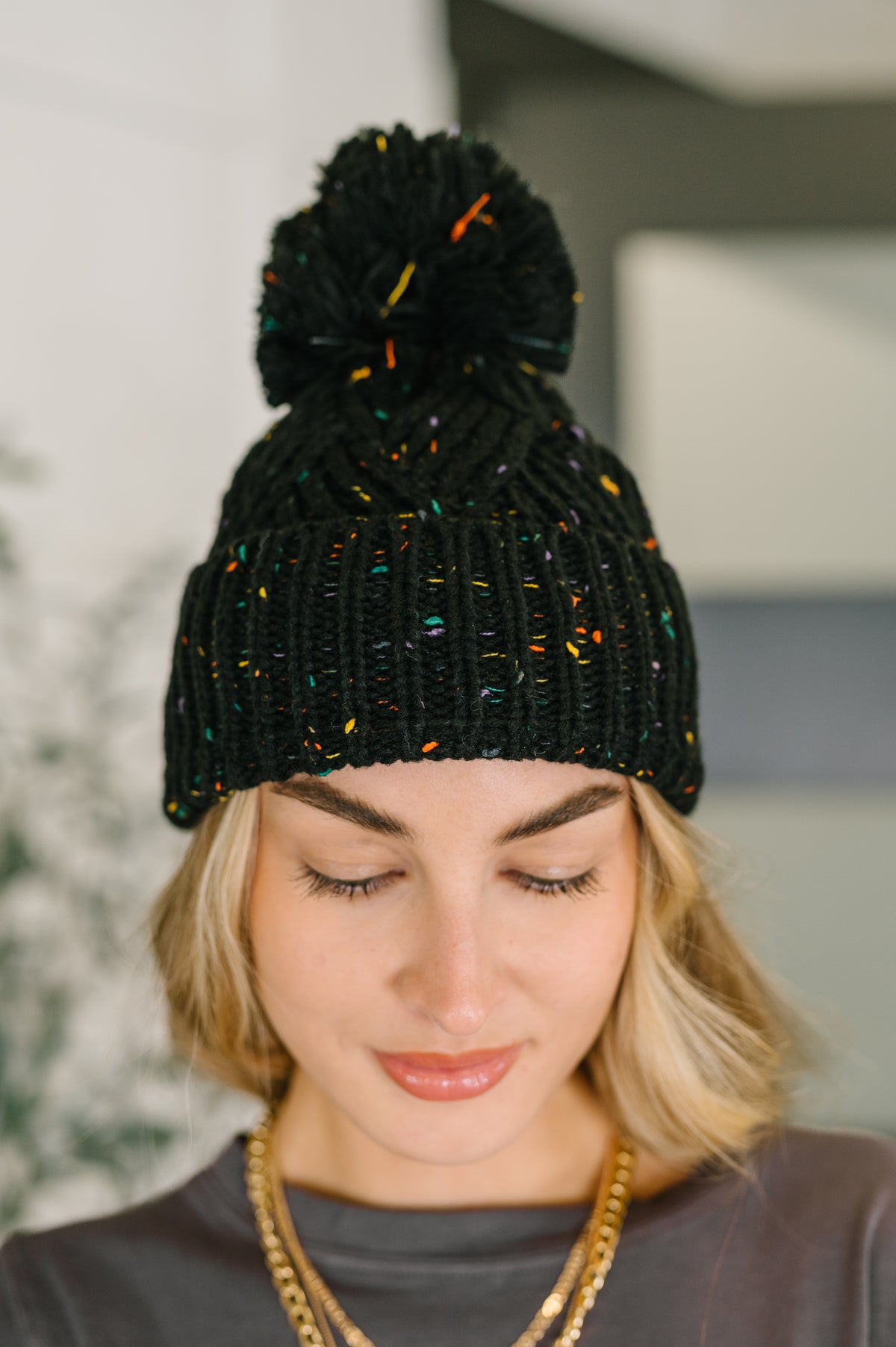 Cover Your Ears Pom Pom Beanie in Black - 12/1/2025