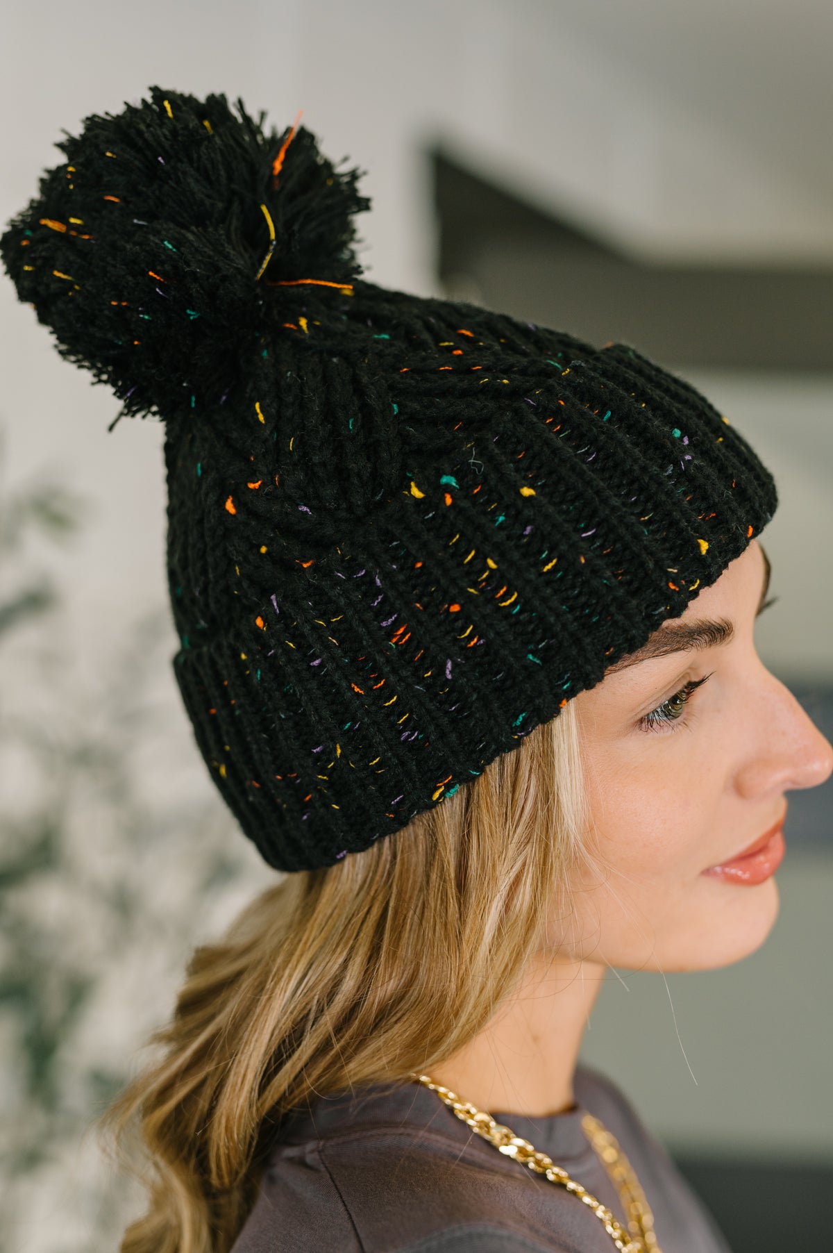 Cover Your Ears Pom Pom Beanie in Black - 12/1/2025