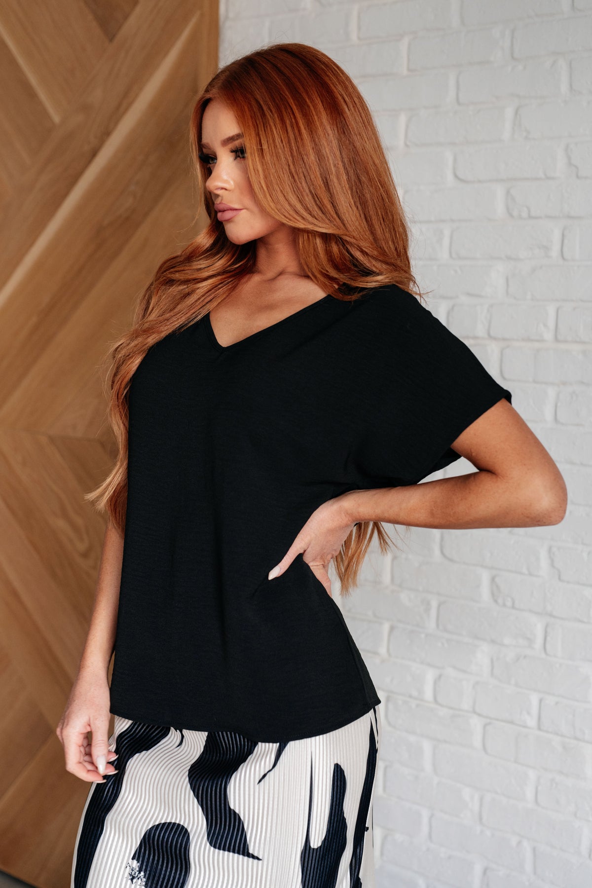 Frequently Asked Questions V-Neck Top in Black - 4/3/2025