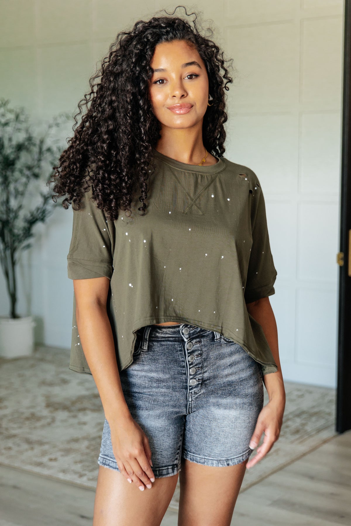 Less Than Stressed Asymmetrical Distressed Top - 8/8/2024