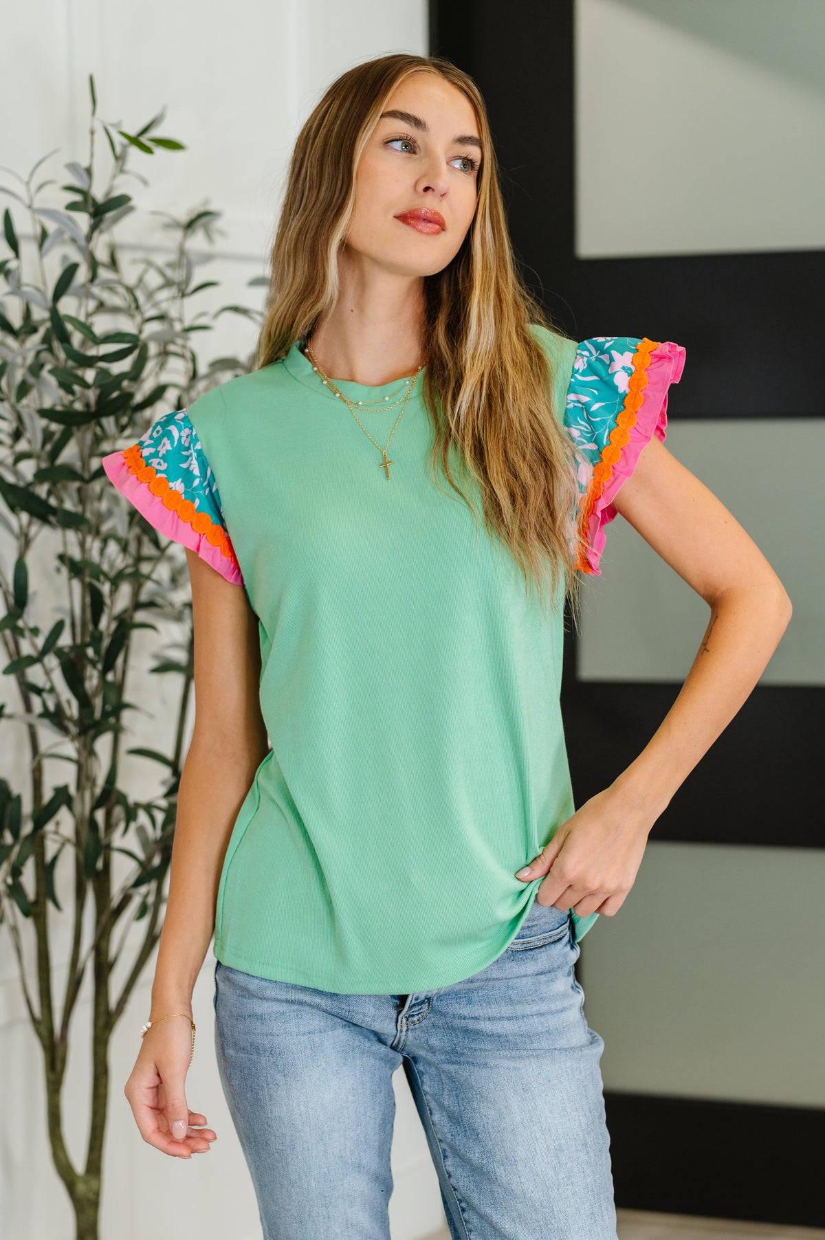 Petals & Poise Floral Flutter Sleeve Top in Green - 8/19/2025