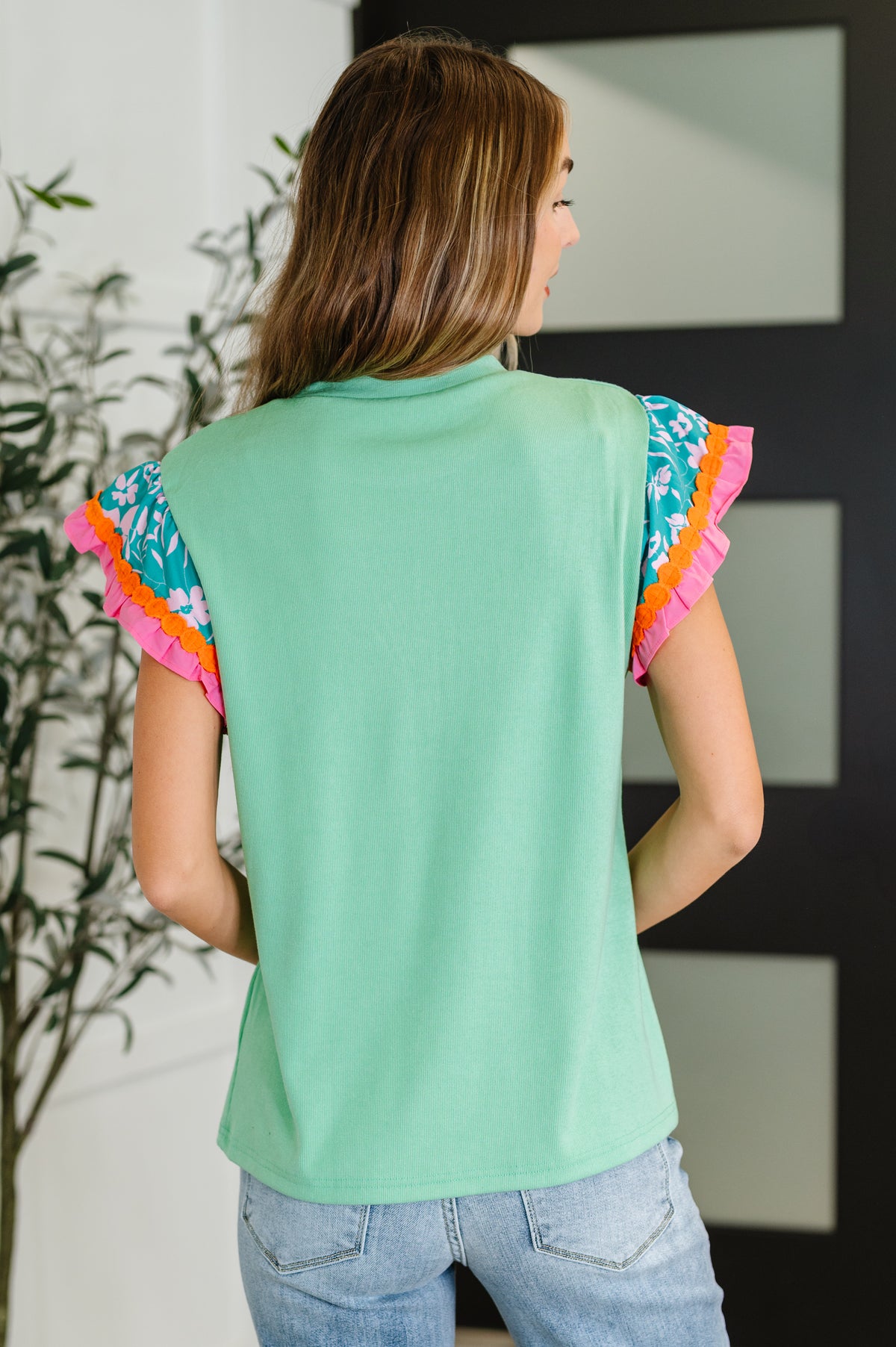 Petals & Poise Floral Flutter Sleeve Top in Green - 8/19/2025