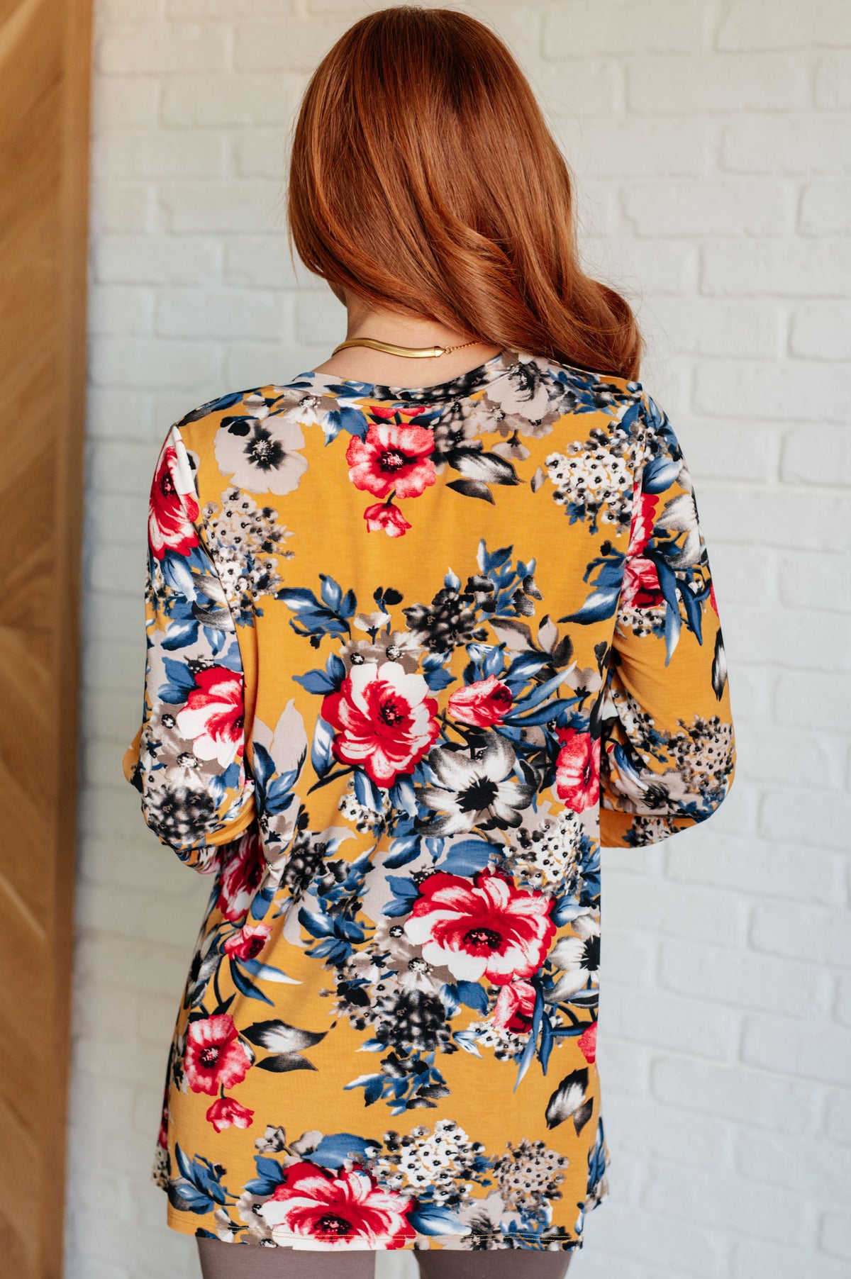 V-Neck Scoop Hem Top in Marigold Floral - 10/10/2024